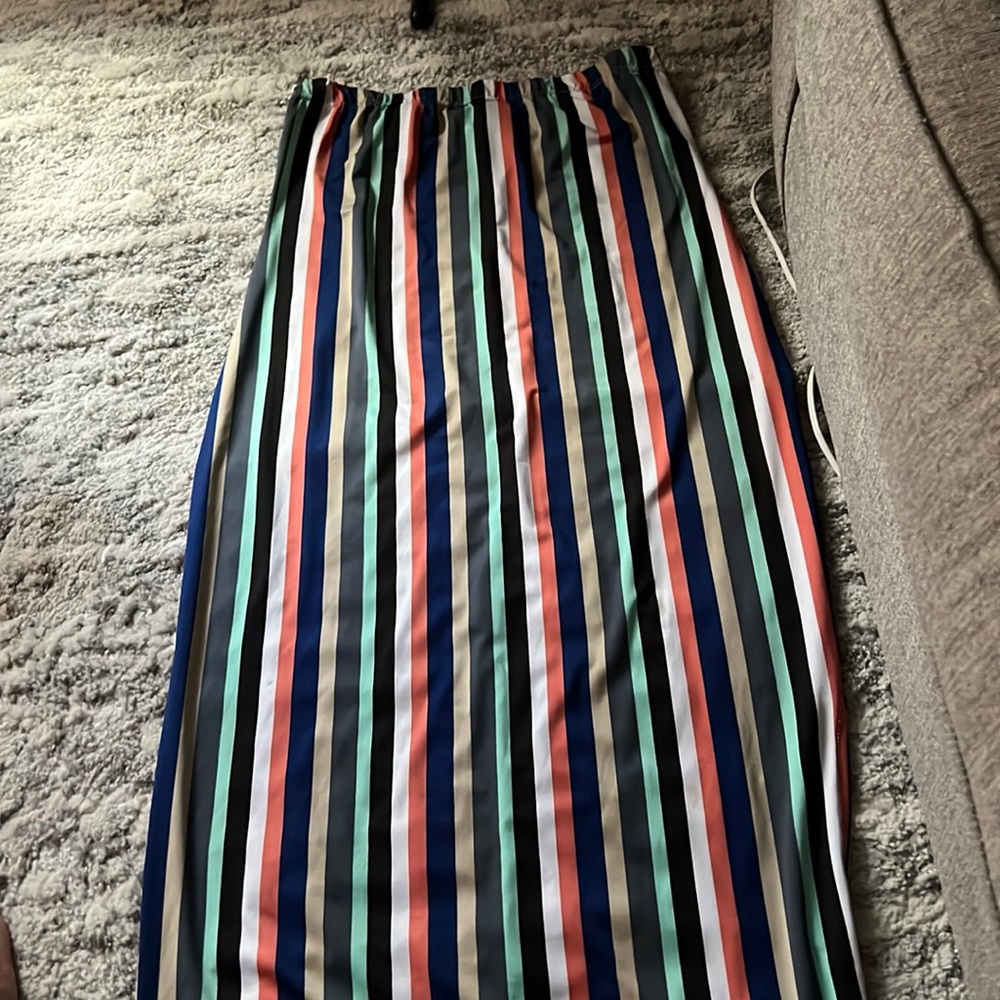 Colorful, strapless, ankle length dress.